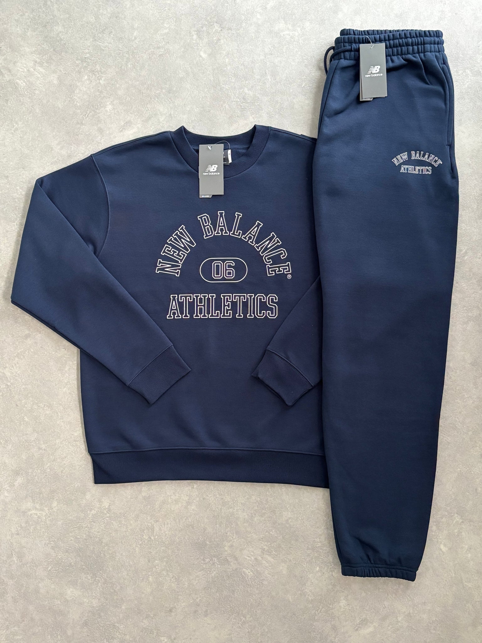 New Balance Fleece Trainingspak Blauw