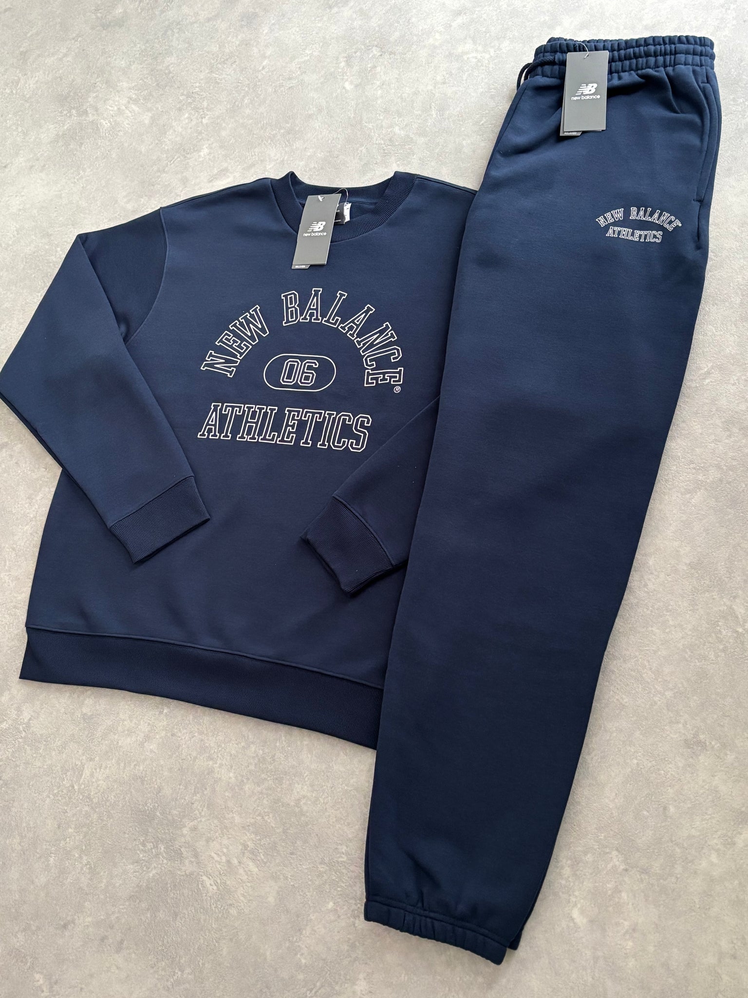 New Balance Fleece Trainingspak Blauw