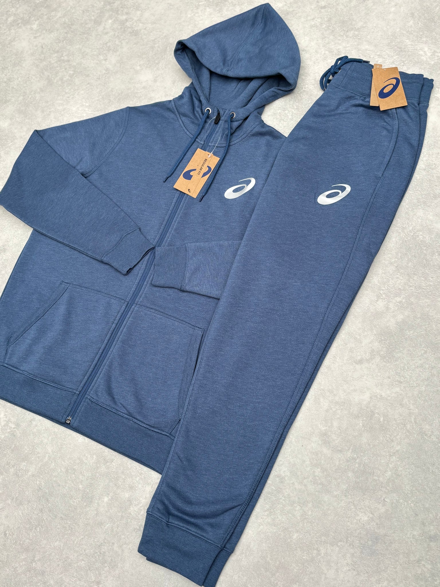 Asics fleece Trainingspak Blauw