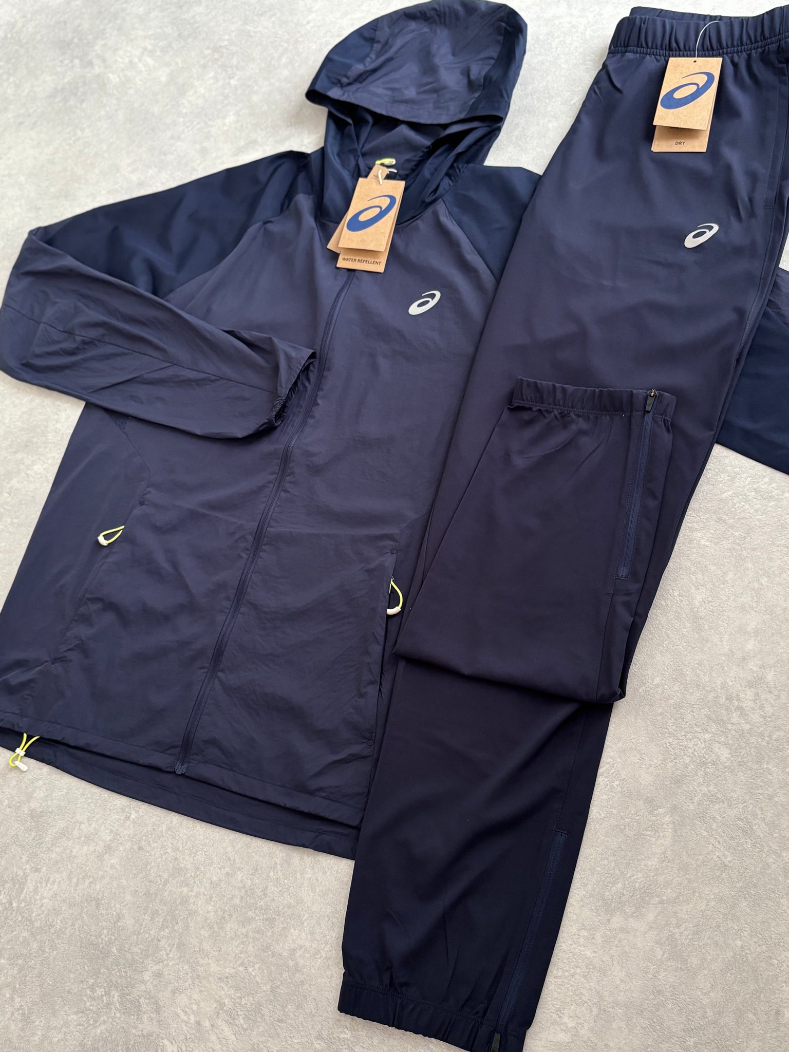 Asics Trainingspak Blauw